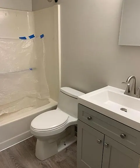 main bathroom with new floor and vanity