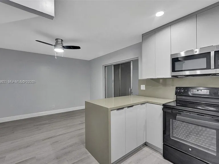 5963 NW 25th Ct #210 — Photo 12