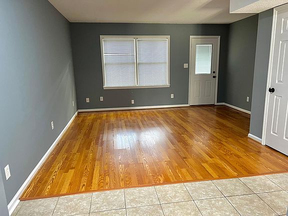 Living Area with Double Windows and Patio / Exit Entrance door