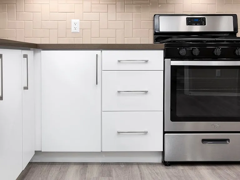 Newly renovated Design Scheme I kitchen with tile backsplash