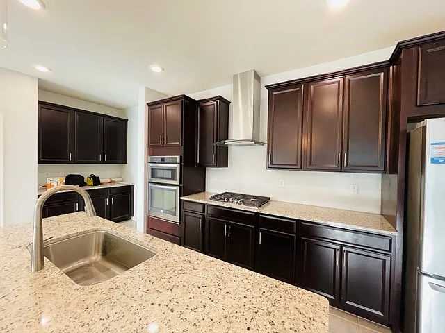 8597 N Genoa Ct — Photo 19