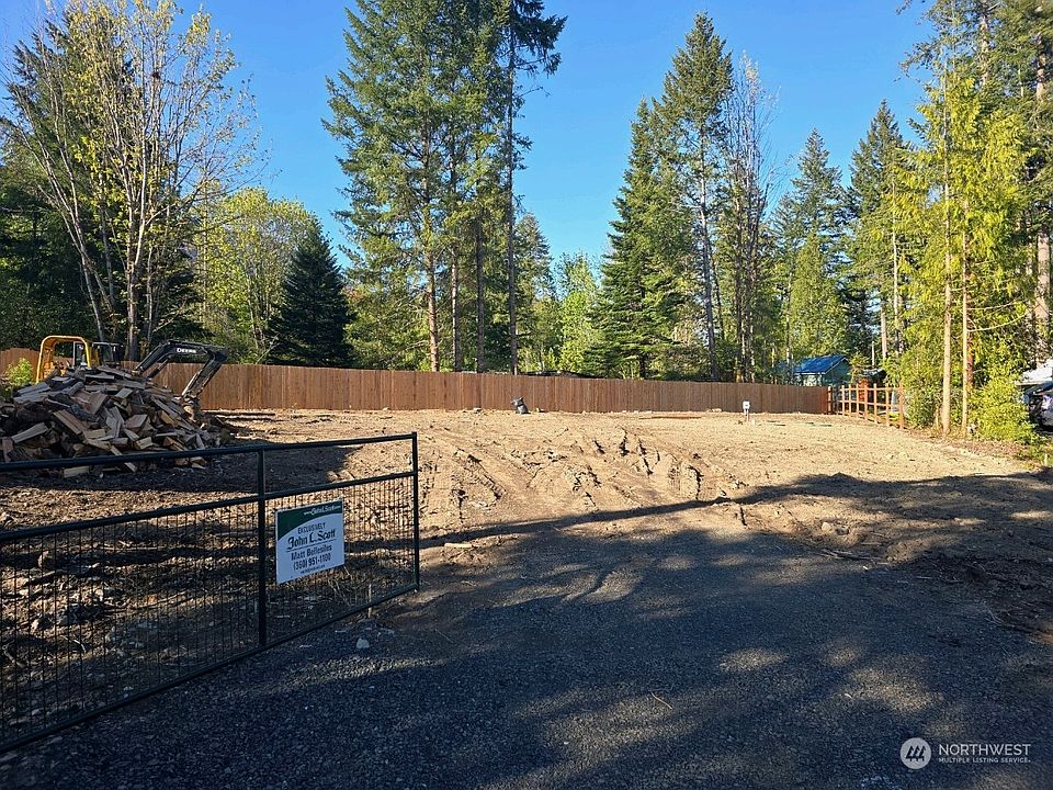 Lot is fenced, septic system installed, ready for the home foundation.>