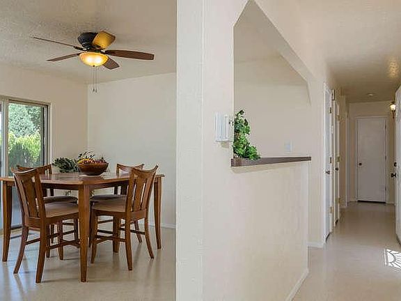 View of hallway. Linen closet at end of hallway.