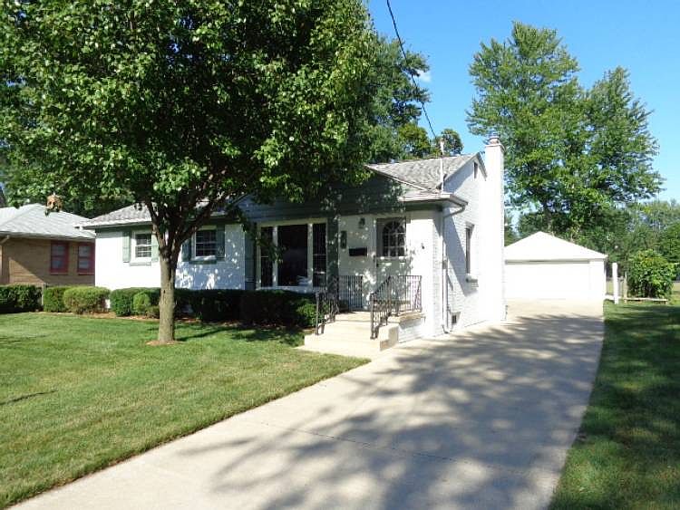 ABSOLUTELY ADORABLE BRICK RANCH BACKS TO PARK!! Full, nicely finished basement and two car garage. Three bedrooms and two full bathrooms. Neutral colors throughout. New carpeting. Central Air. Sprinkler system. Abundant storage. Impeccably maintained and move in ready!!