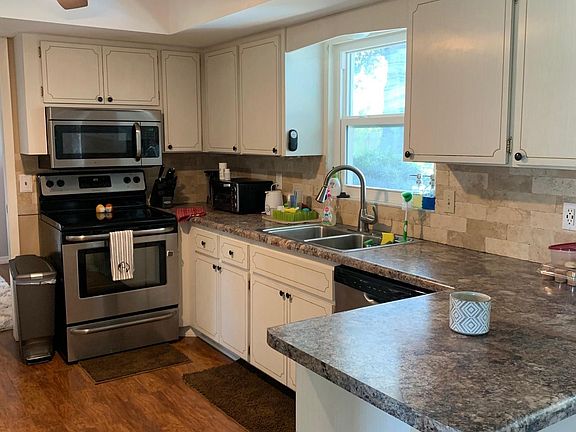Kitchen- including brand new refrigerator and stainless steel appliances