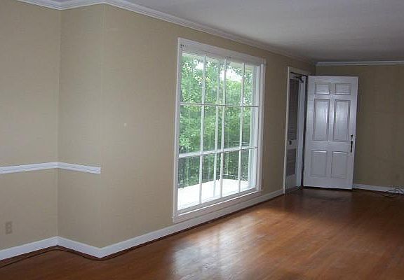 Large LR with picture window
(walls are now painted white)