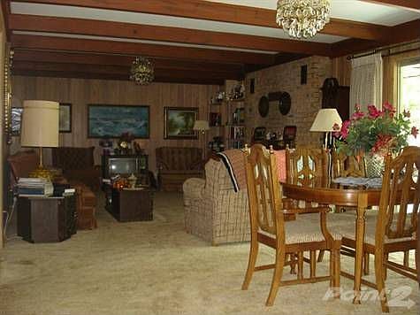 Den with fireplace and ex dining spacef