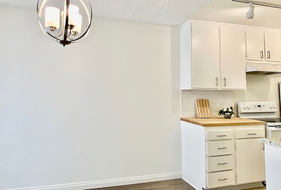 DINING RM & SIDE OF KITCHEN