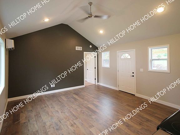 The living area has a contrast wall.