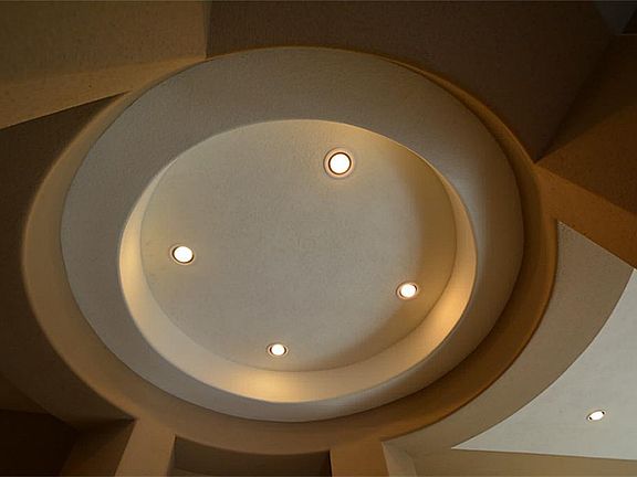 Stunning Circular Coffered Layered Ceiling to welcome you home.