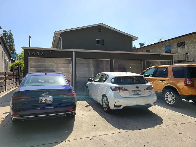 single car garage, with storage and driveway spot