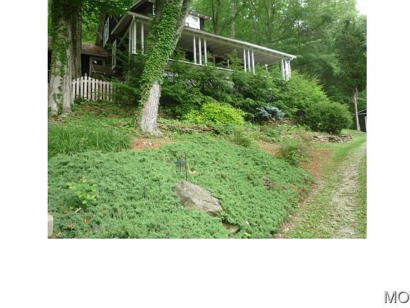Nestled in a mature landscape