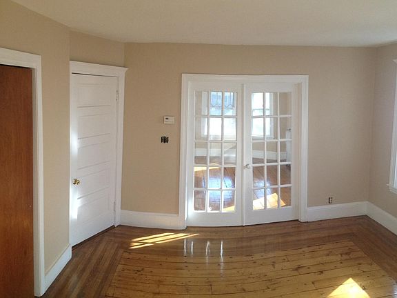 Living Room with French Doors to Bedroom and door to front hallway