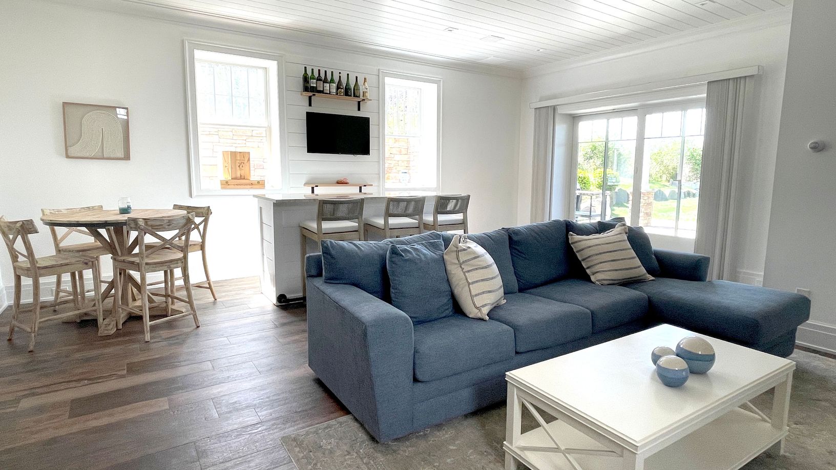  Rec. room with bar, oversized TV, half bath, laundry, and games