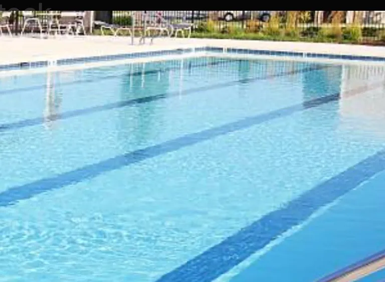 Access to community pool and jacuzzi for relaxation and enjoyment.
