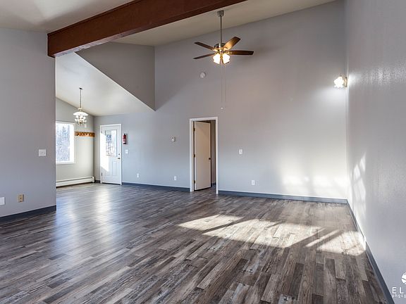 living room with vaulted 