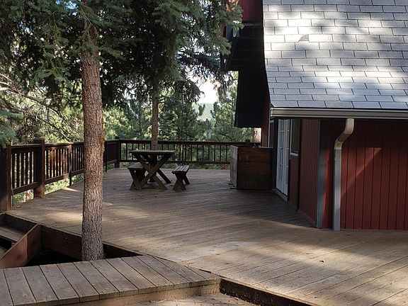 Spectacular deck to main level. Front door is to left.