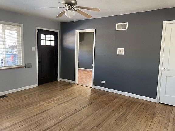 Living room area. Master bedroom with bathroom located at the left of main entrance.