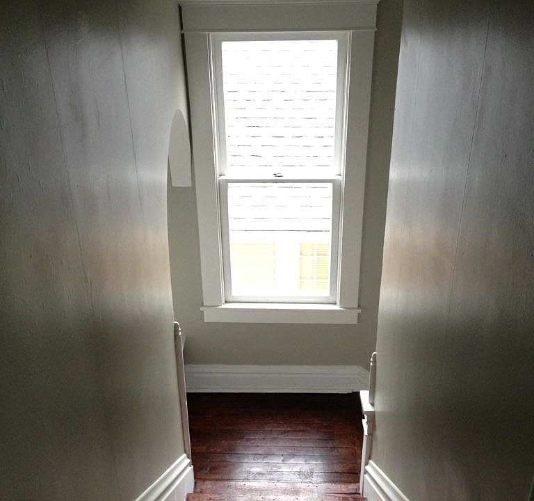 Looking down the stairs at the nook/landing