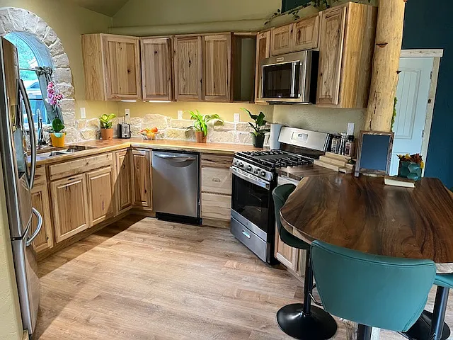 Large kitchen with loads of storage.