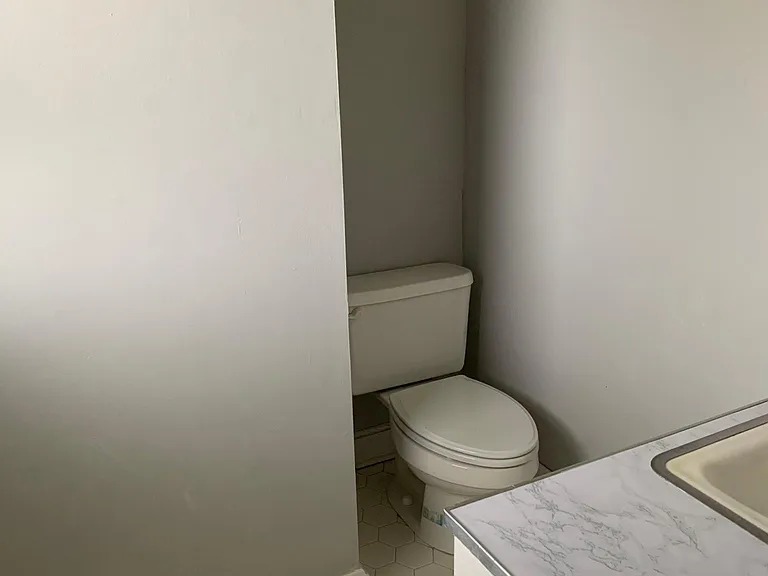 Half bath off principal bedroom.