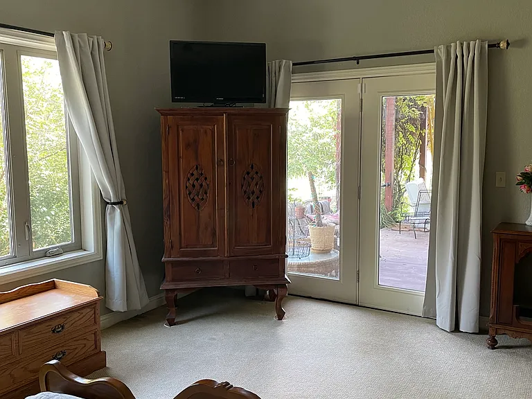 Bedroom #1 patio door entry and TV