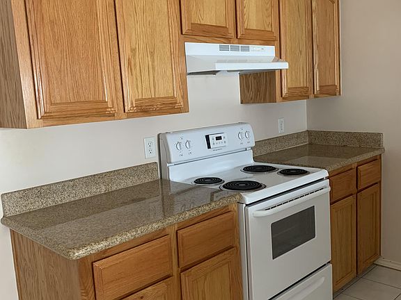 Kitchen with Stove and cabinetry
