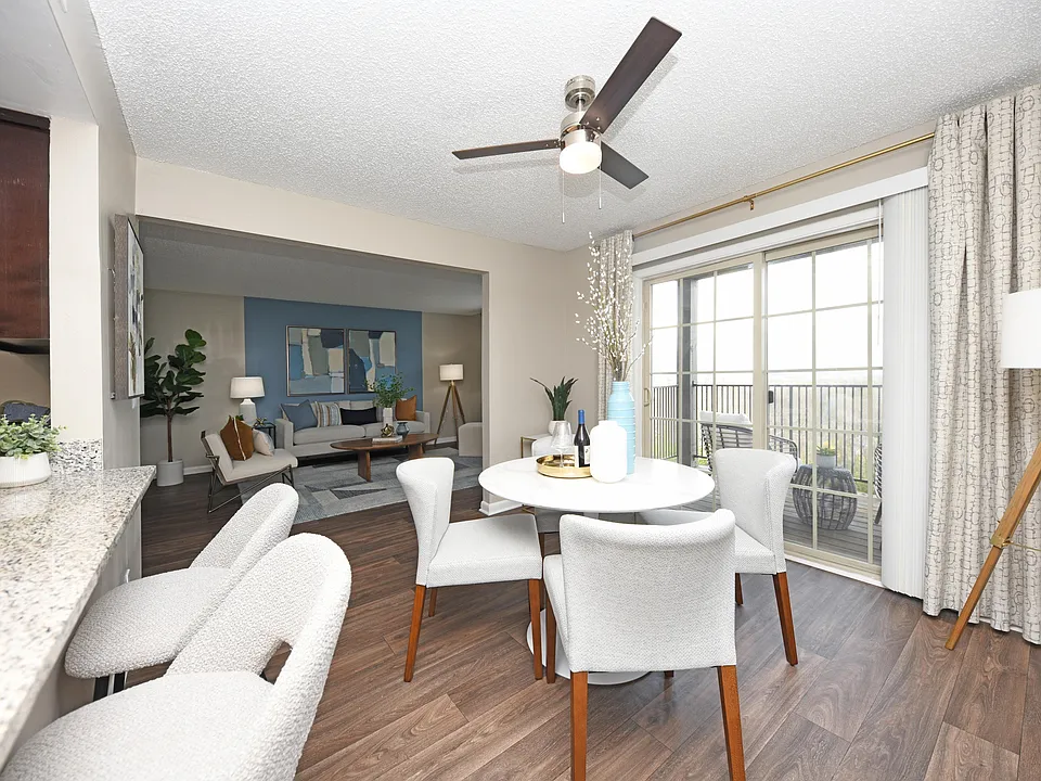Dining area with hardwood-style flooring
