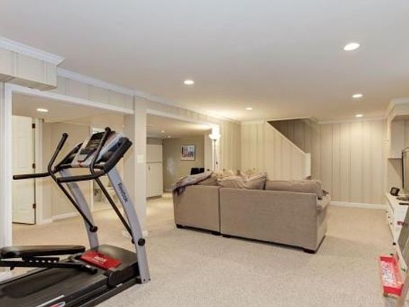 Finished lower level, extra refrigerator, full bath, laundry and private exit.