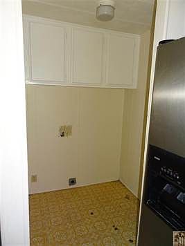 Laundry Room with Access to Backyard/Covered Patio area