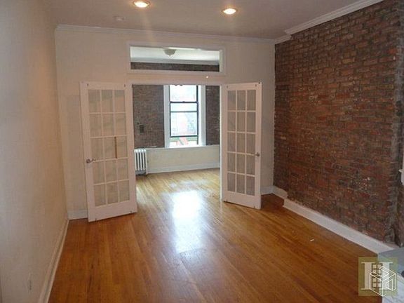 3rd image of 73 E 3rd St APT C1
