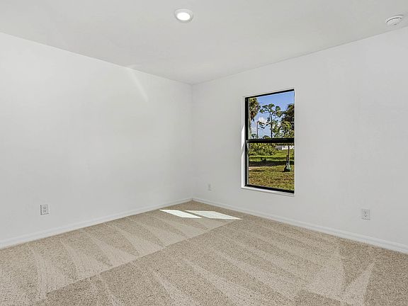 Relax and unwind in the master suite after a long day