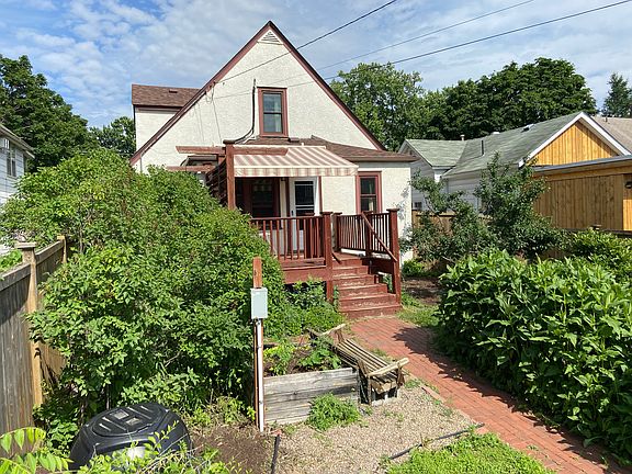 from back fence showing deck and awning