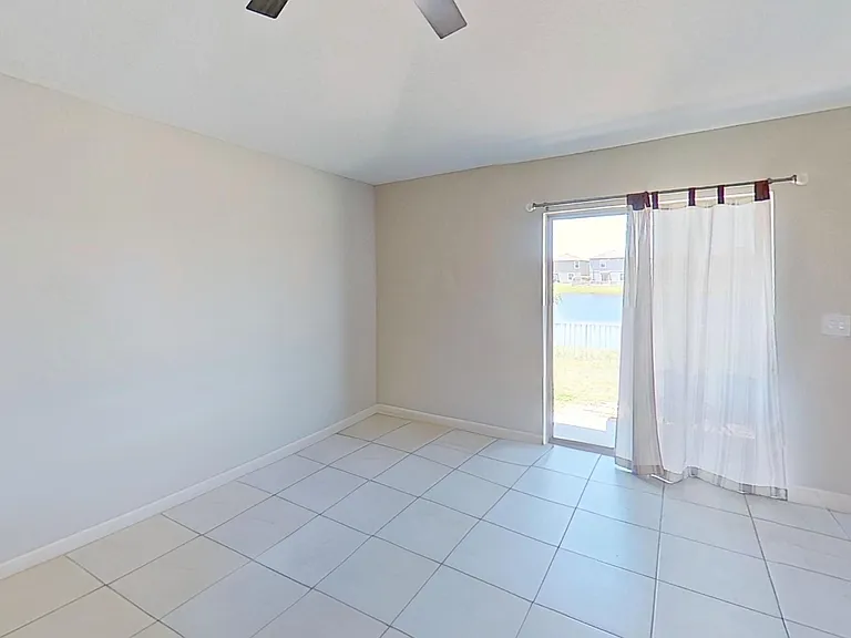 Modern kitchen with granite countertops, a spacious island, and an open layout perfect for entertaining.