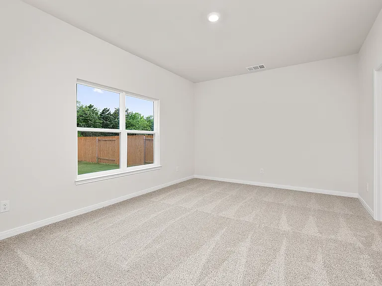 The master suite has a large bedroom, ensuite bathroom and walk-in closet.