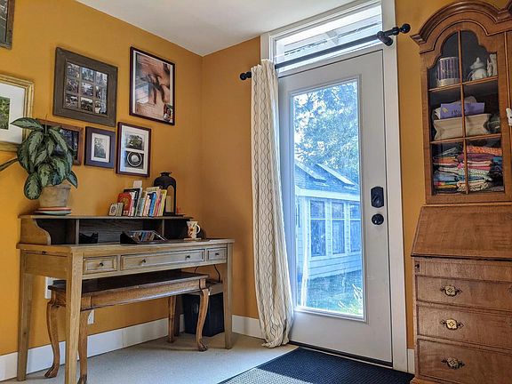 Home office with door to backyard