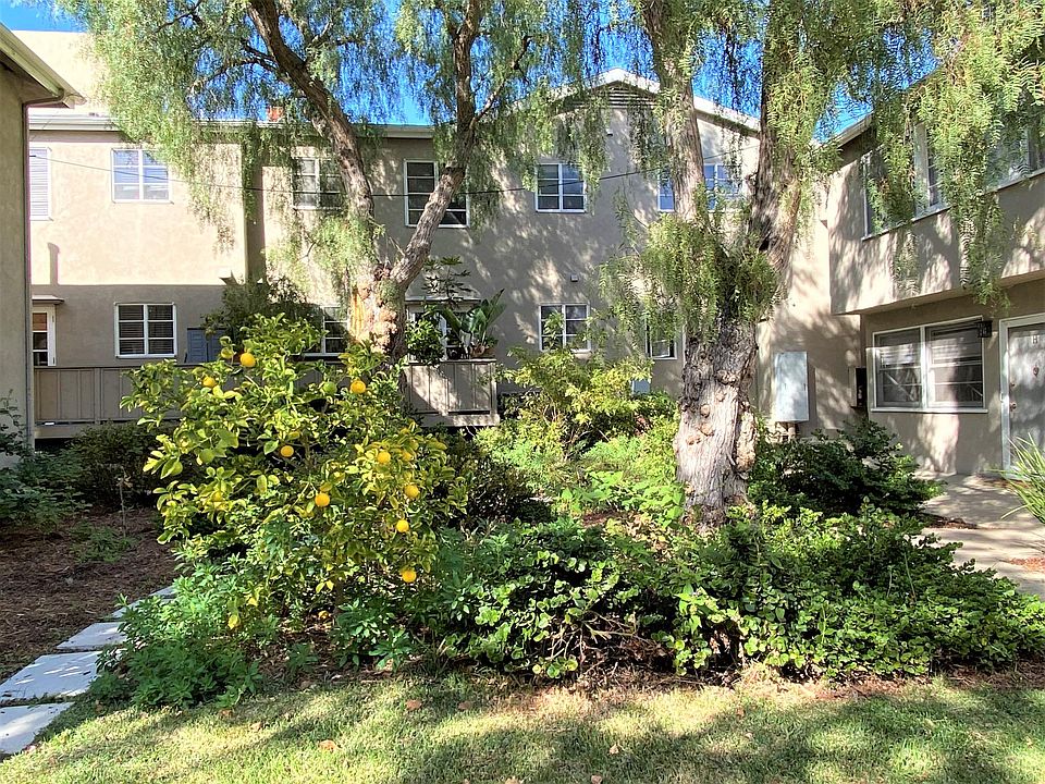 Welcoming, lush, entrance courtyard