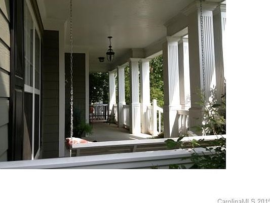 Large porch with swing