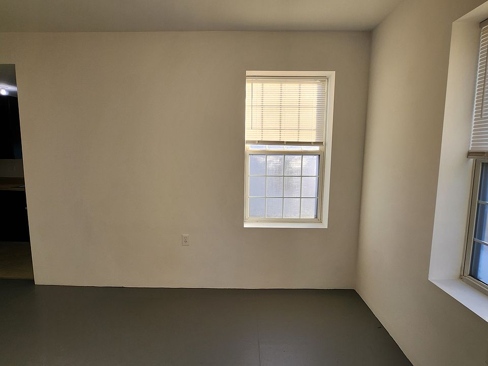 Living Room with view into the kitchen