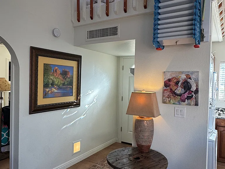 Front door, loft with folded stairs.