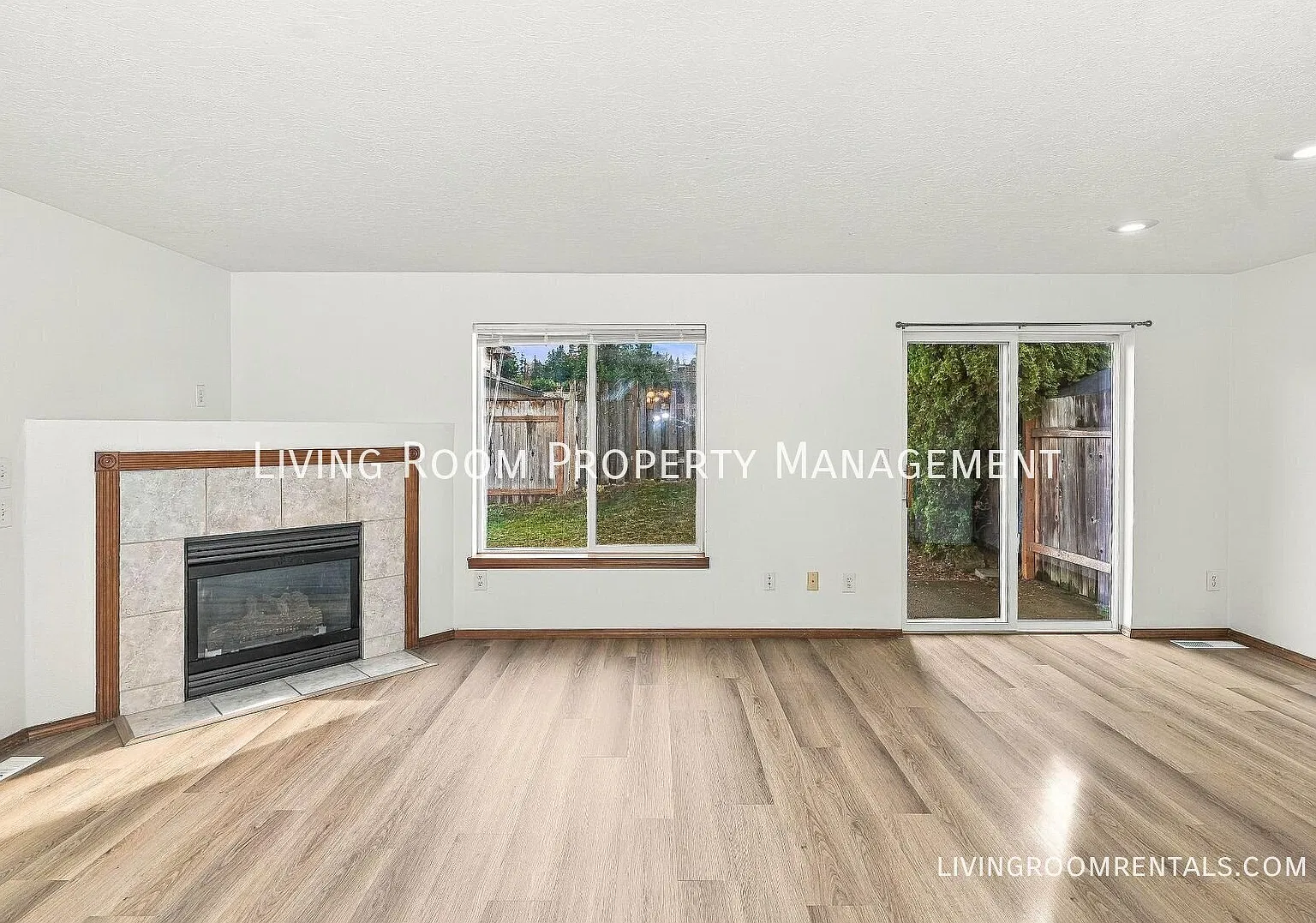 Tucked-Away NE Portland Gem with a Fireplace, Primary Suite & Space to Spare — Photo 3