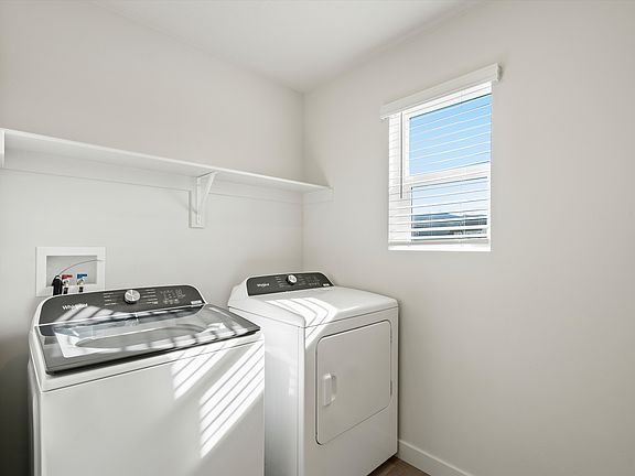 The Pine floorplan interior image taken at a Meritage Homes Community in Tooele, UT.