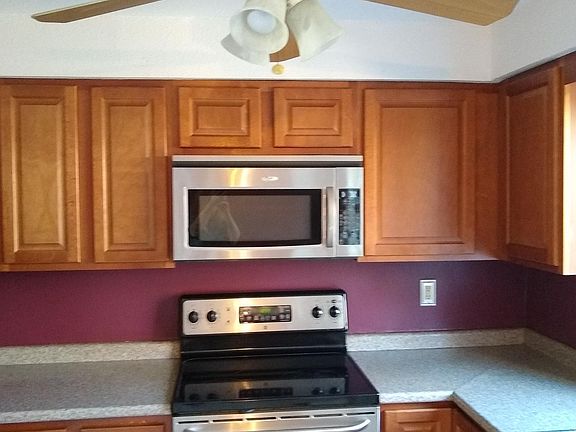 Part of the Kitchen, also dining section in front of sliding doors, opposite end of the kitchen