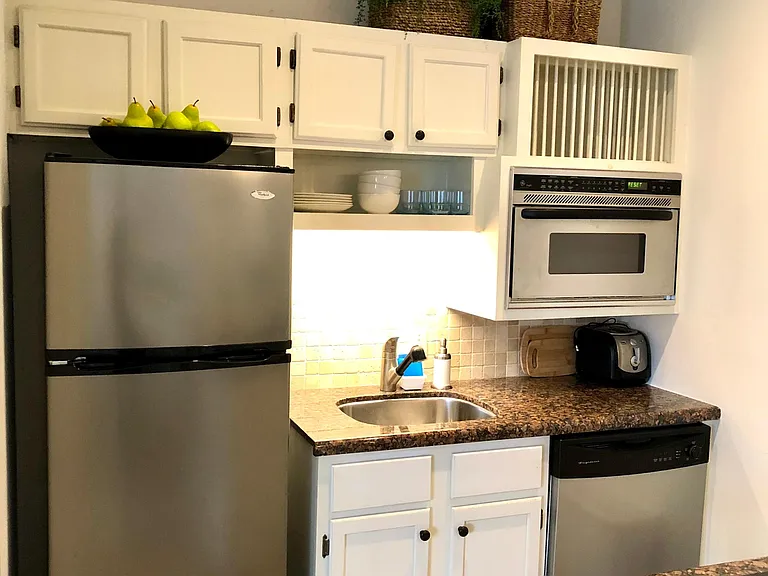 Newly remodeled kitchen includes all stainless appliances.