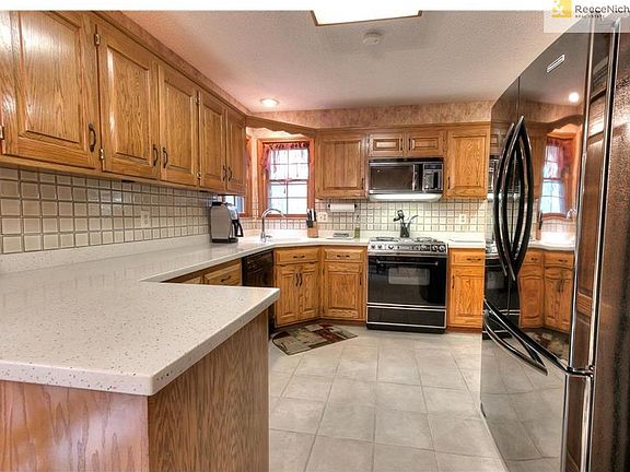 Updated kitchen with corner sink