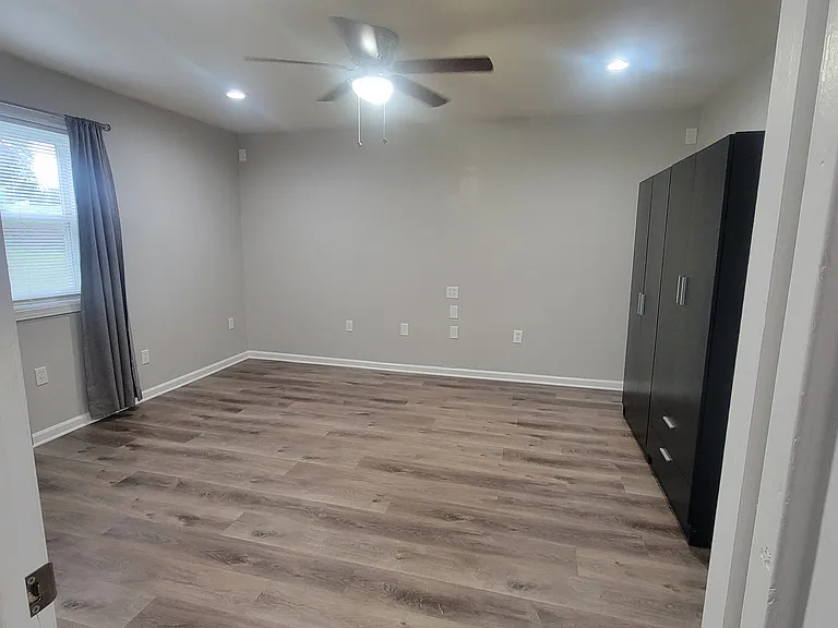 Bedroom with 2 armoire for clothing storage