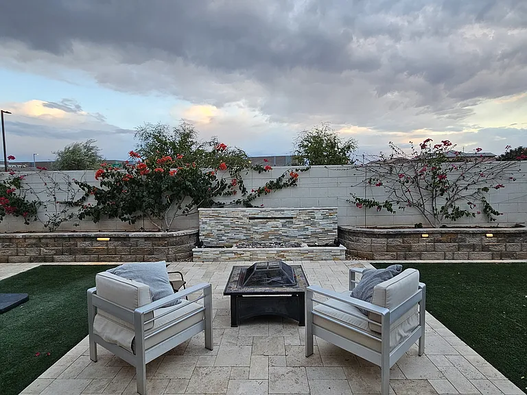 Backyard - Firepit and water feature.