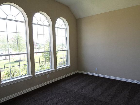 OFFICE WITH LARGE WINDOWS AND FRENCH DOORS