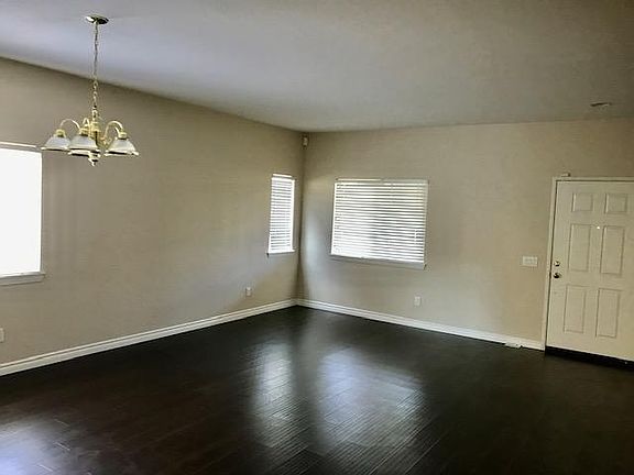 Formal living room and front entrance to home