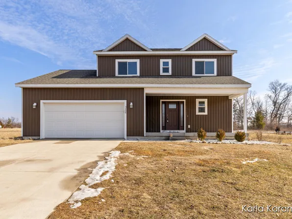 5268 N Point Dr, Pierson, MI 49339